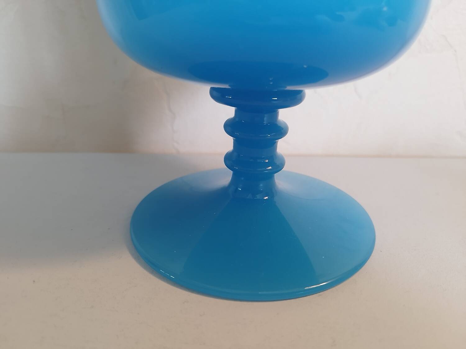 Blue vase on opaline pedestal