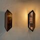 Pair of French wall lights with geometric design in copper, 1960, France.