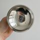 Small silver-plated metal bowl on a stand.