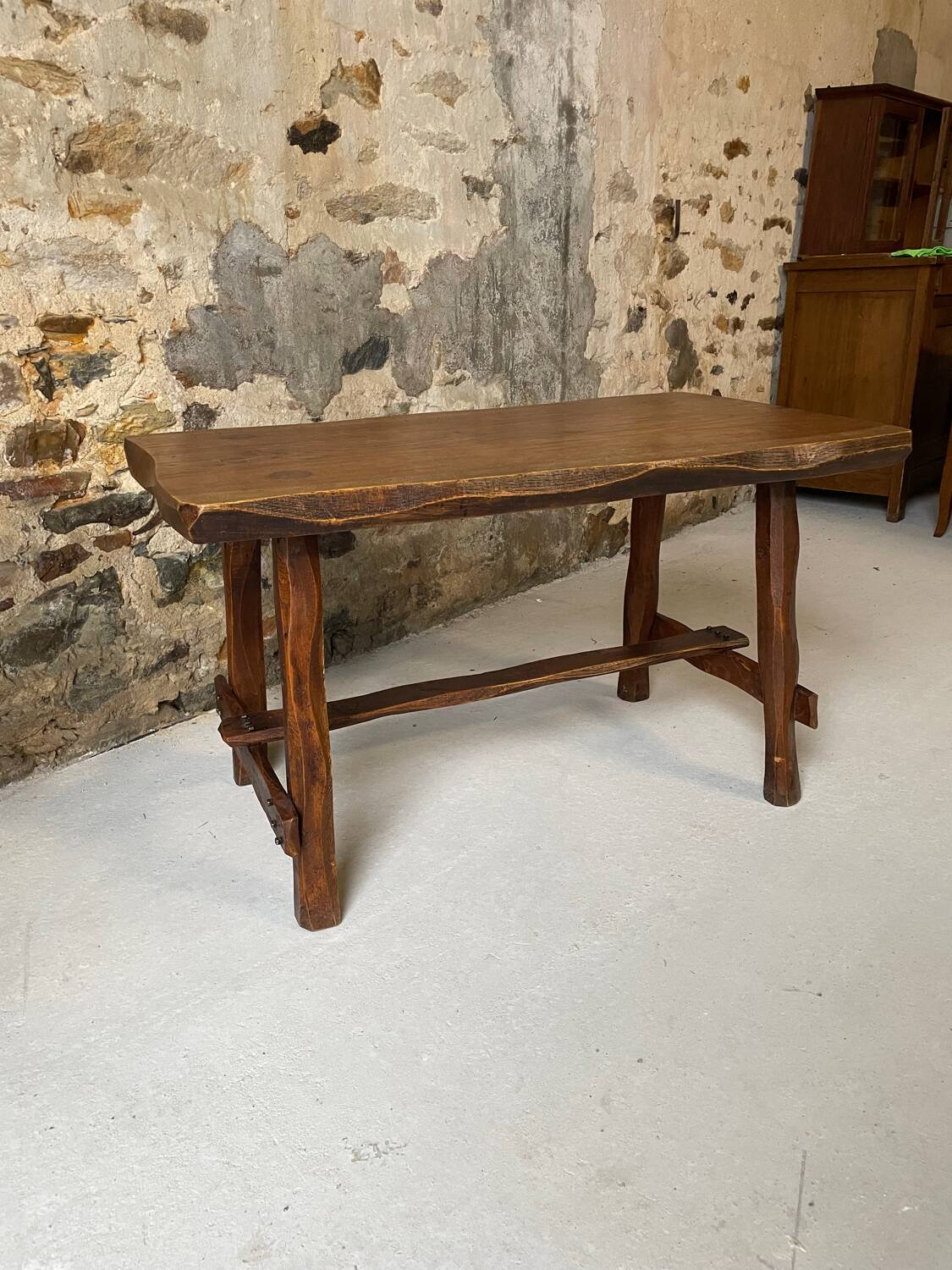 Small rustic table made of solid wood.