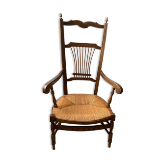 High-back straw armchair