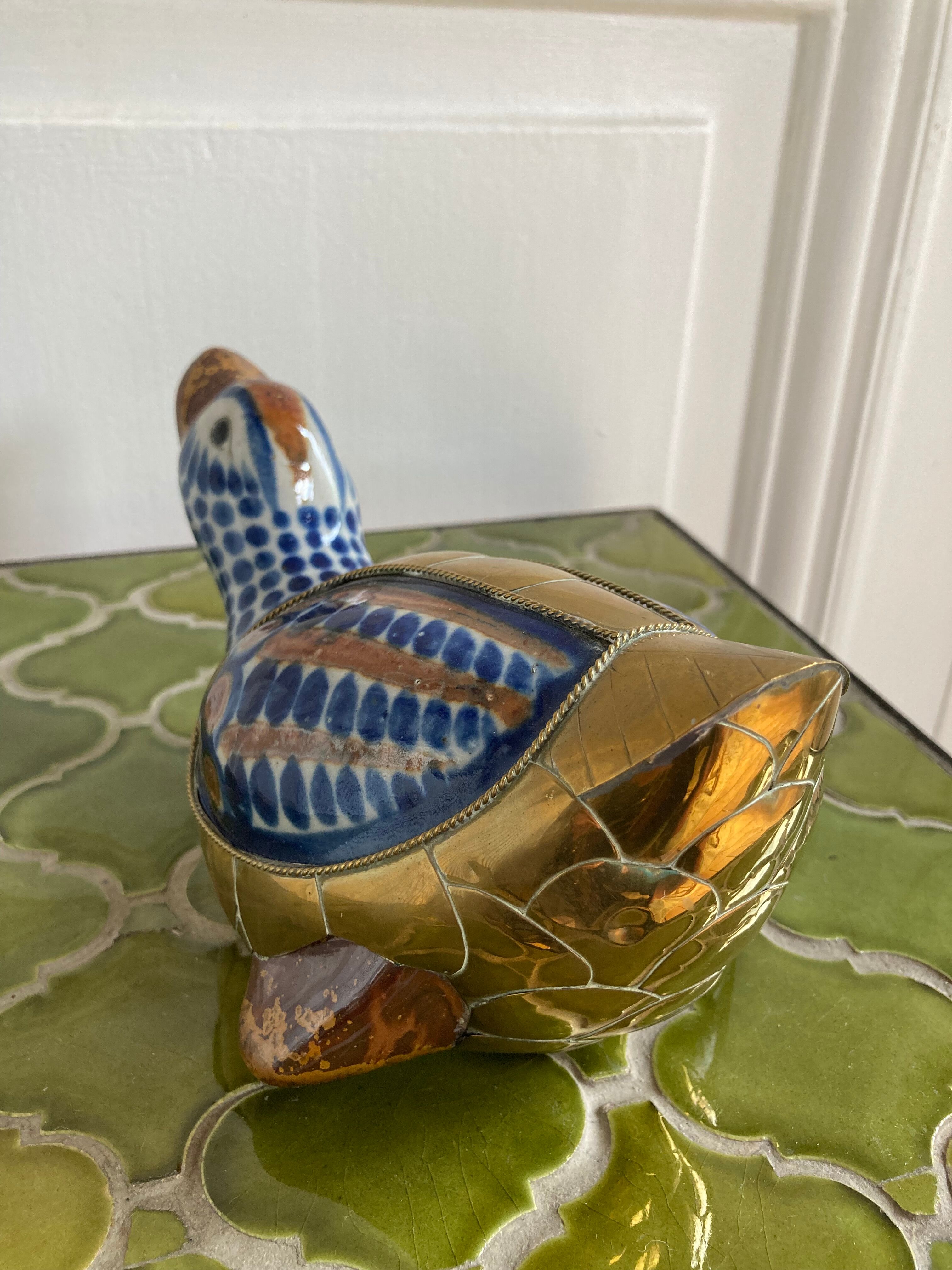 Brass duck and ceramic