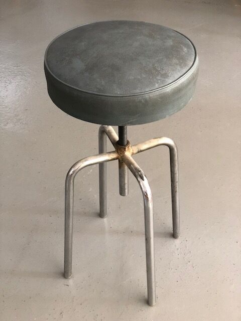 Industrial stool with adjustable height