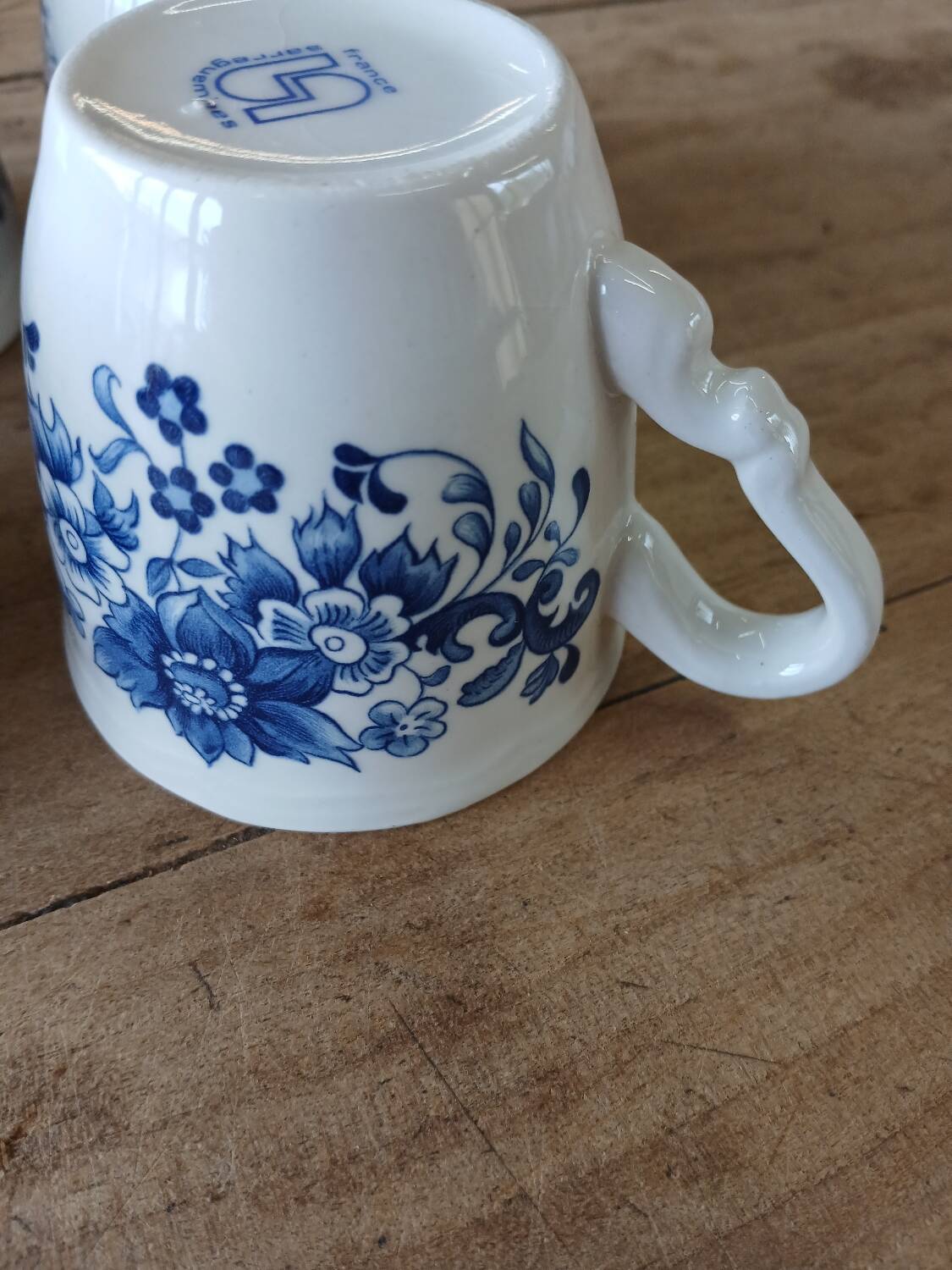 4 antique cups and saucers