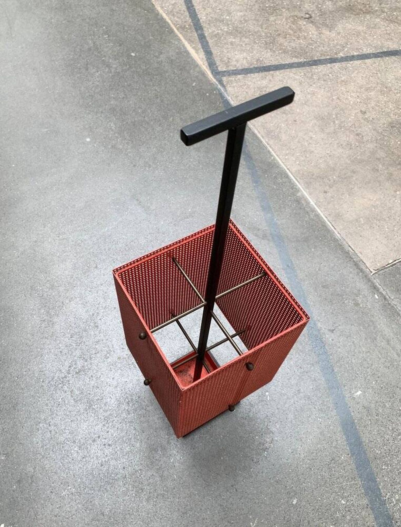 Minimalist perforated steel umbrella stand, 1960s