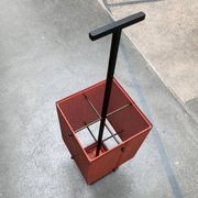 Minimalist perforated steel umbrella stand, 1960s