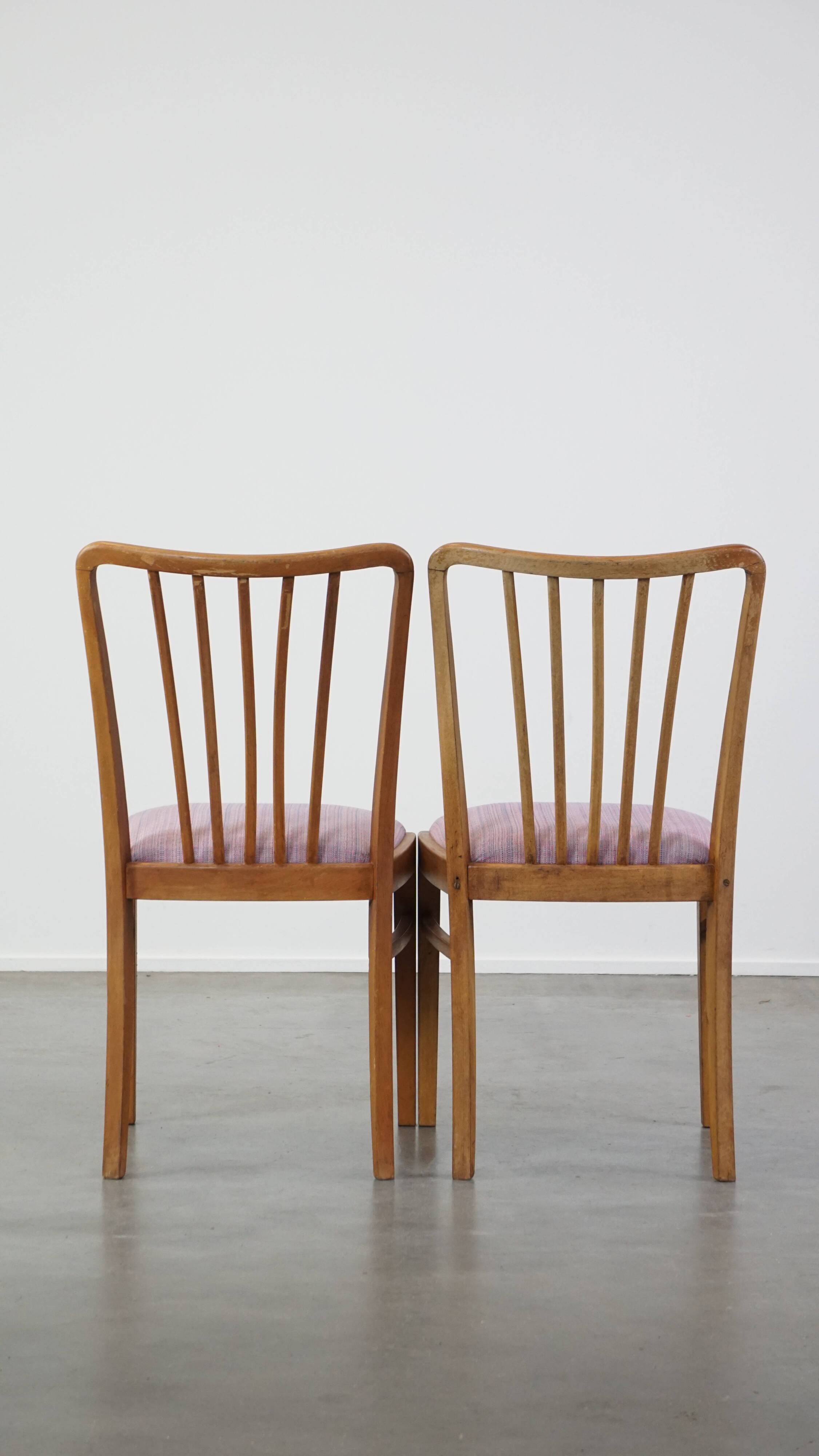 Set of 4 vintage Danish design dining chairs from the 1970s with light purple fabric seats