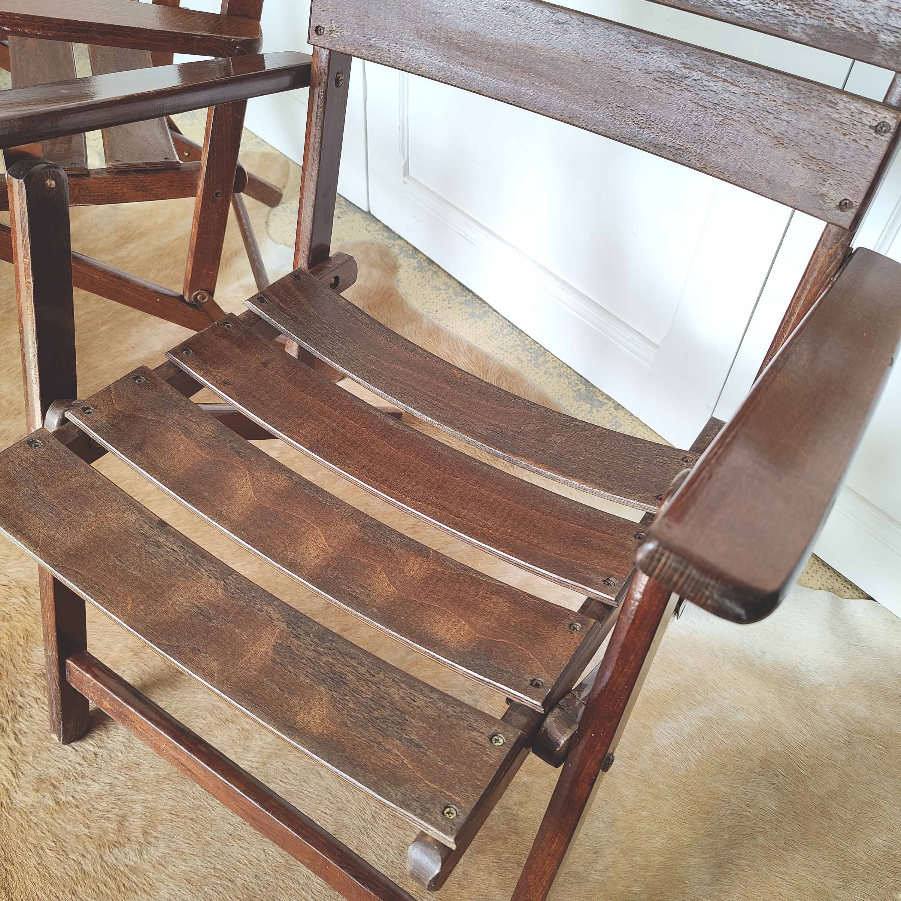 Pair of folding wooden armchairs