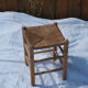 Farm stool made of wood and straw