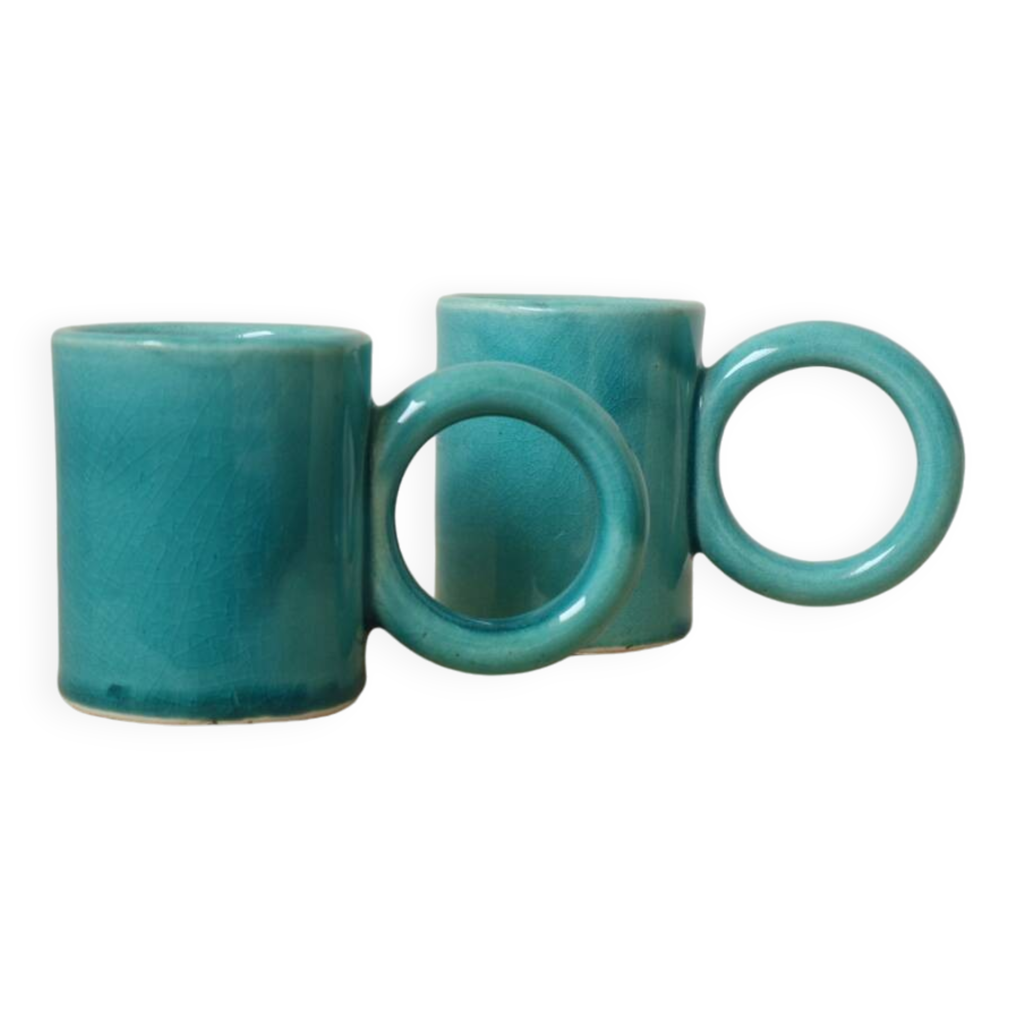 Pair of handmade turquoise ceramic coffee cups with large handles