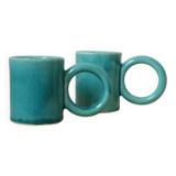 Pair of handmade turquoise ceramic coffee cups with large handles