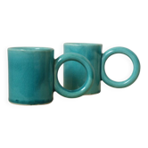 Pair of handmade turquoise ceramic coffee cups with large handles