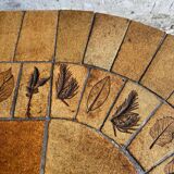 Roger Capron brown-ochre ceramic tile coffee table with wooden base, oval leaf-motif top