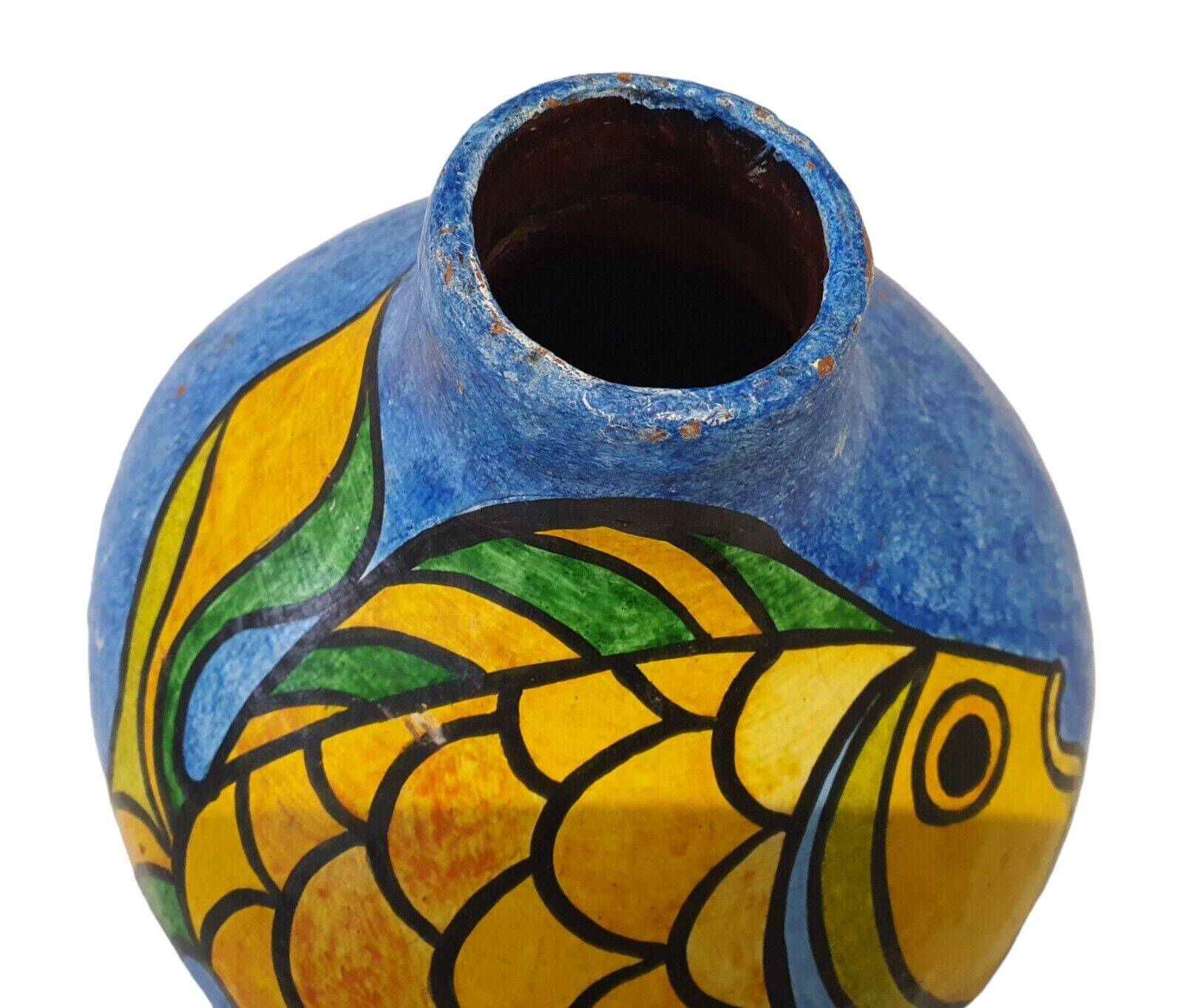 Painted terracotta vase decorated with a fish “ball” vase