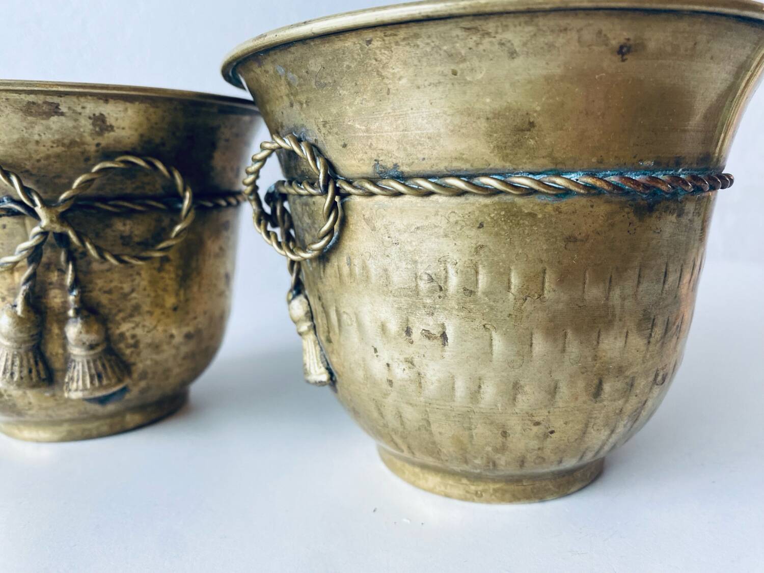 Pair of brass cord pot covers