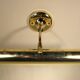 Two gold metal picture sconces