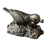 Door knocker/knocker. Woodpecker on tree trunk. In cast iron with a golden patina