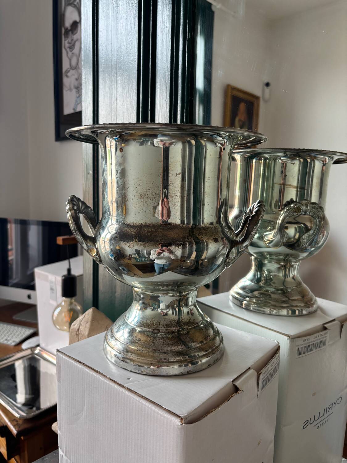 Silver metal champagne bucket.