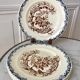 Set of 4 flat plates in Terre de Fer, Rocaille model, 19th century