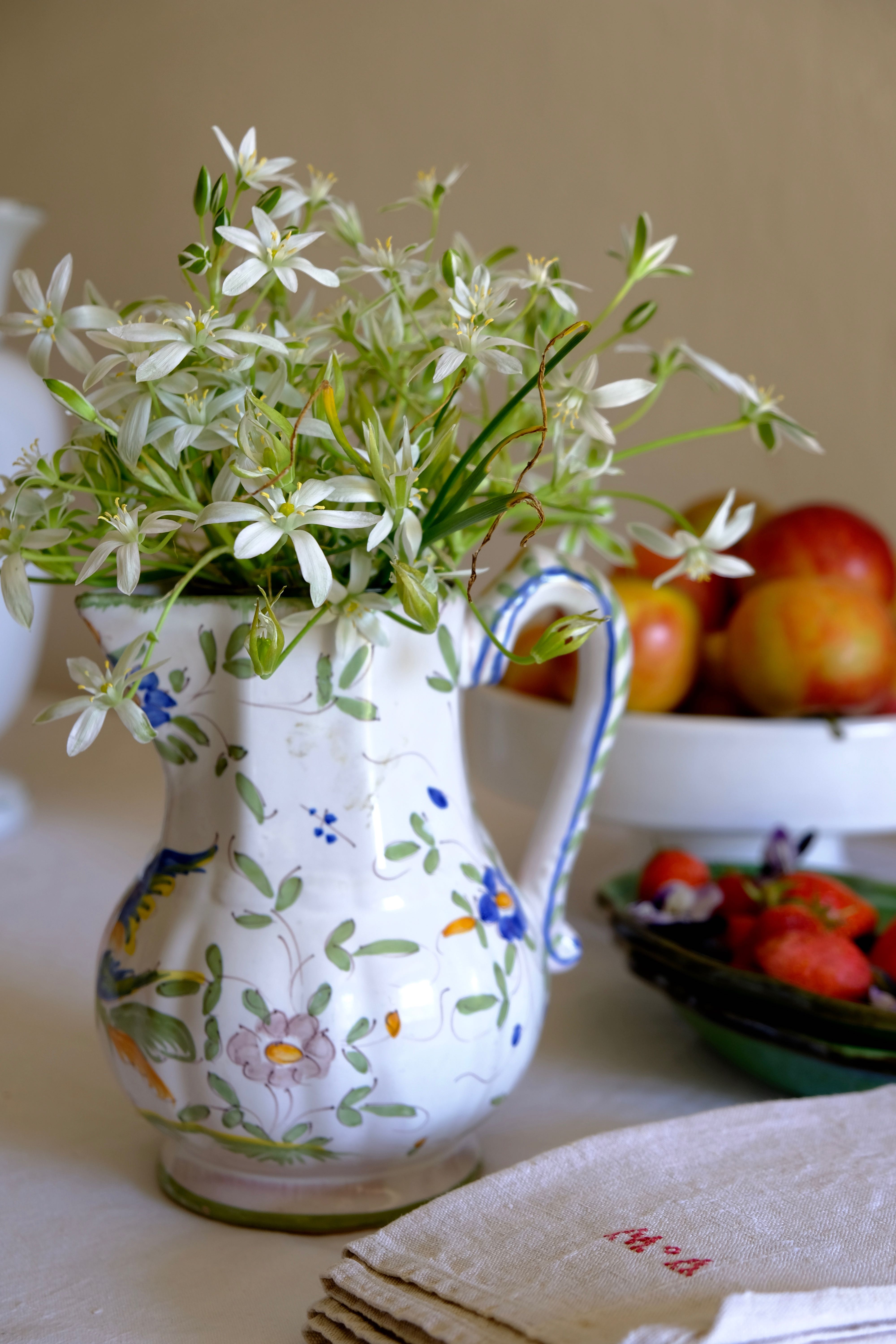 Painted Moustiers earthenware pitcher