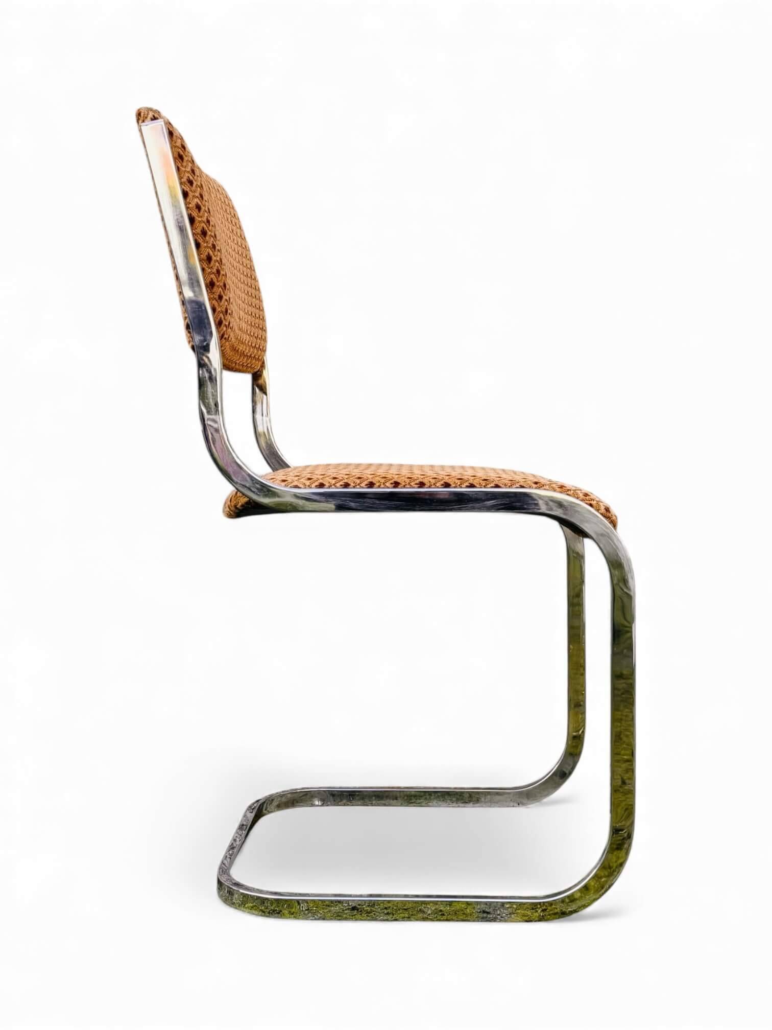 Set of 4 vintage sled chairs from the 1970s