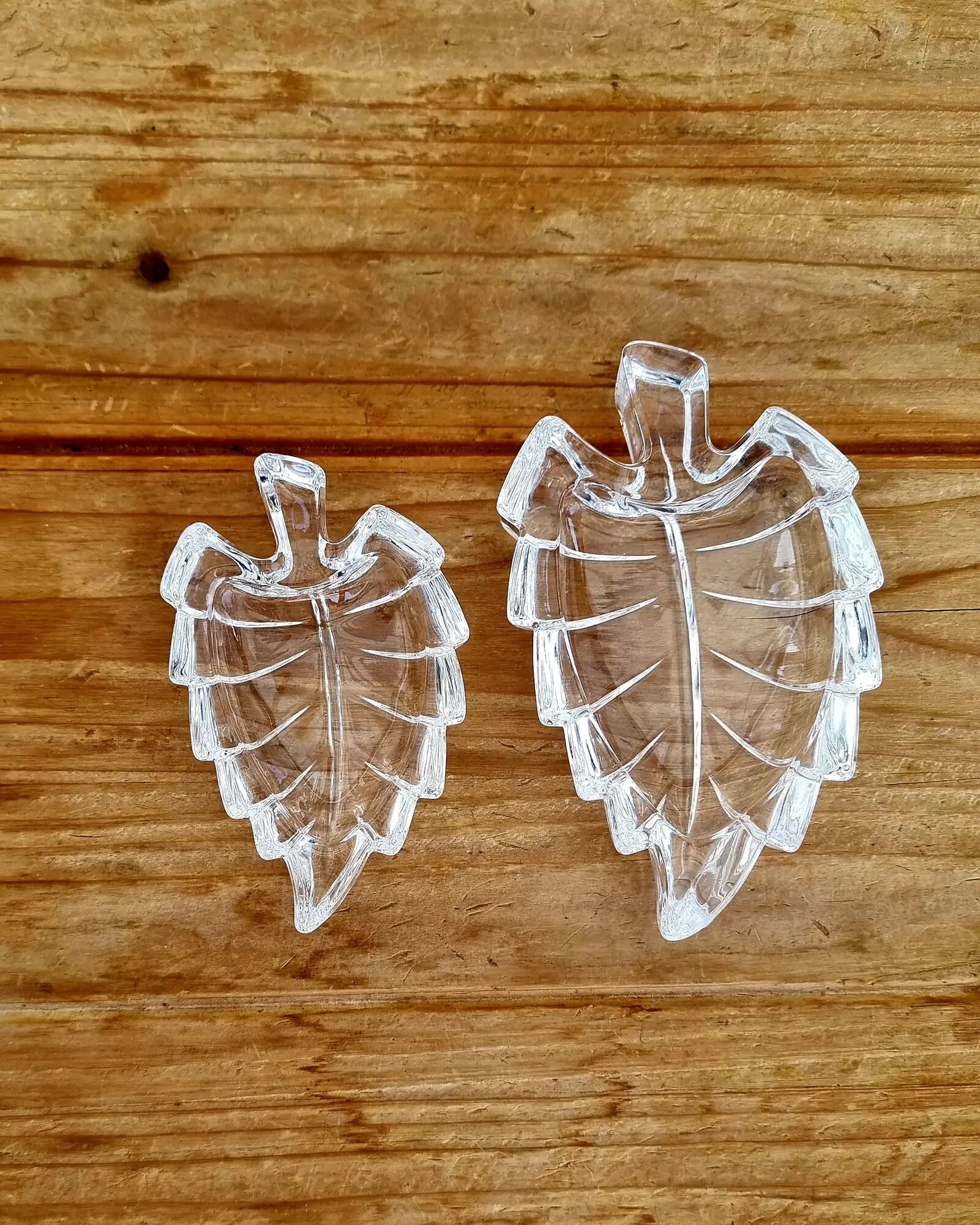 Pair of vintage leaf-shaped glass bowls from the 1970s.