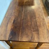 Walnut bistro table, feet turned.