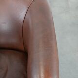 Cognac-coloured cow leather club armchair in English style