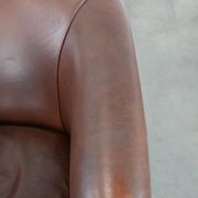Cognac-coloured cow leather club armchair in English style