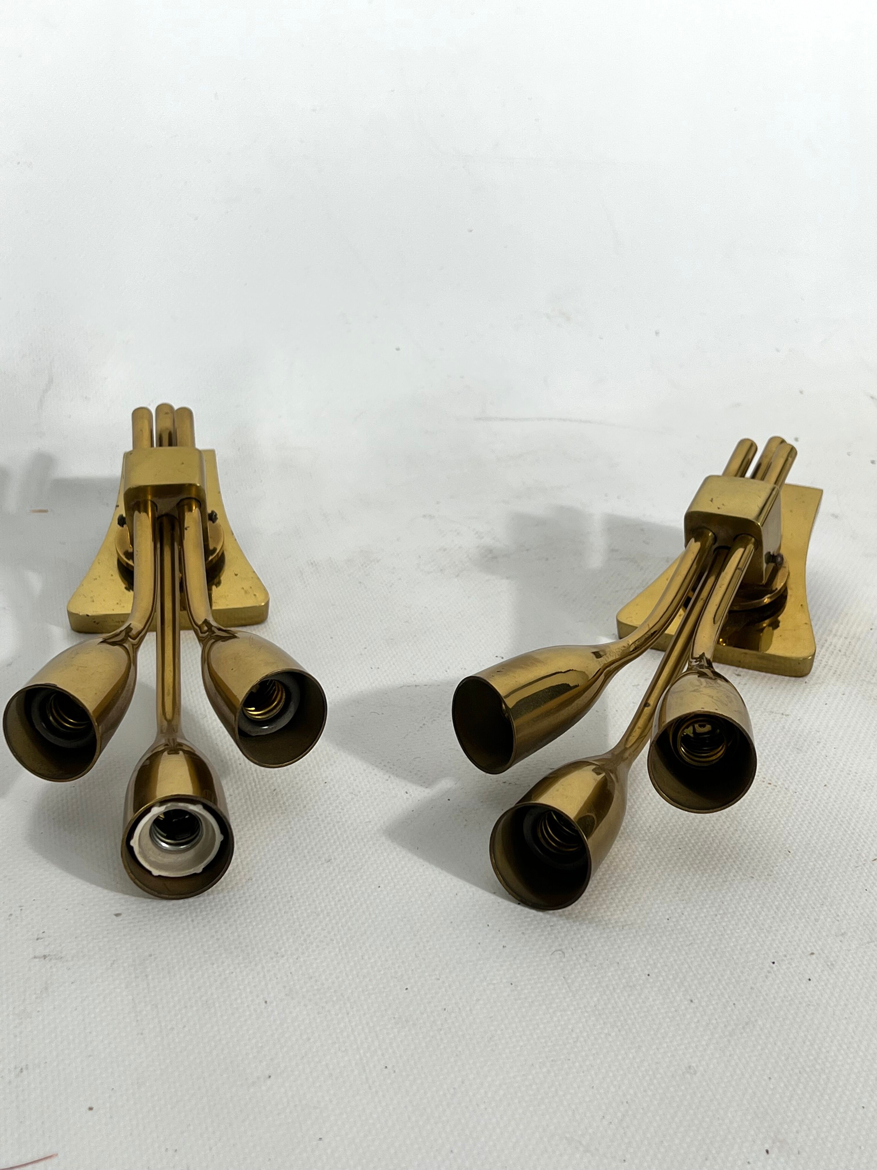 Lumi Milano, Mid-Century Modern pair of Italian brass sconces from 60s