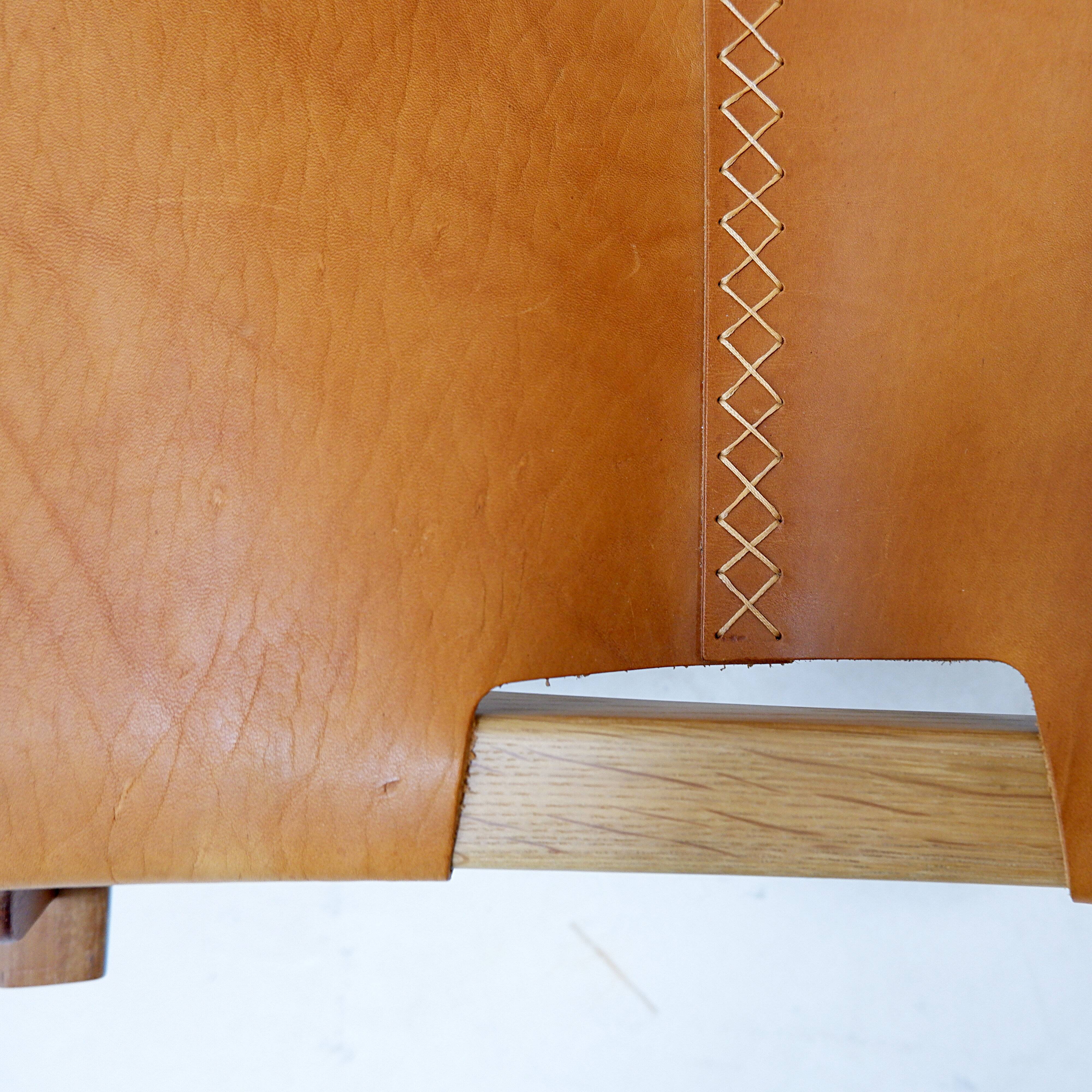 Vintage Scandinavian-style lounge chair in wood and leather