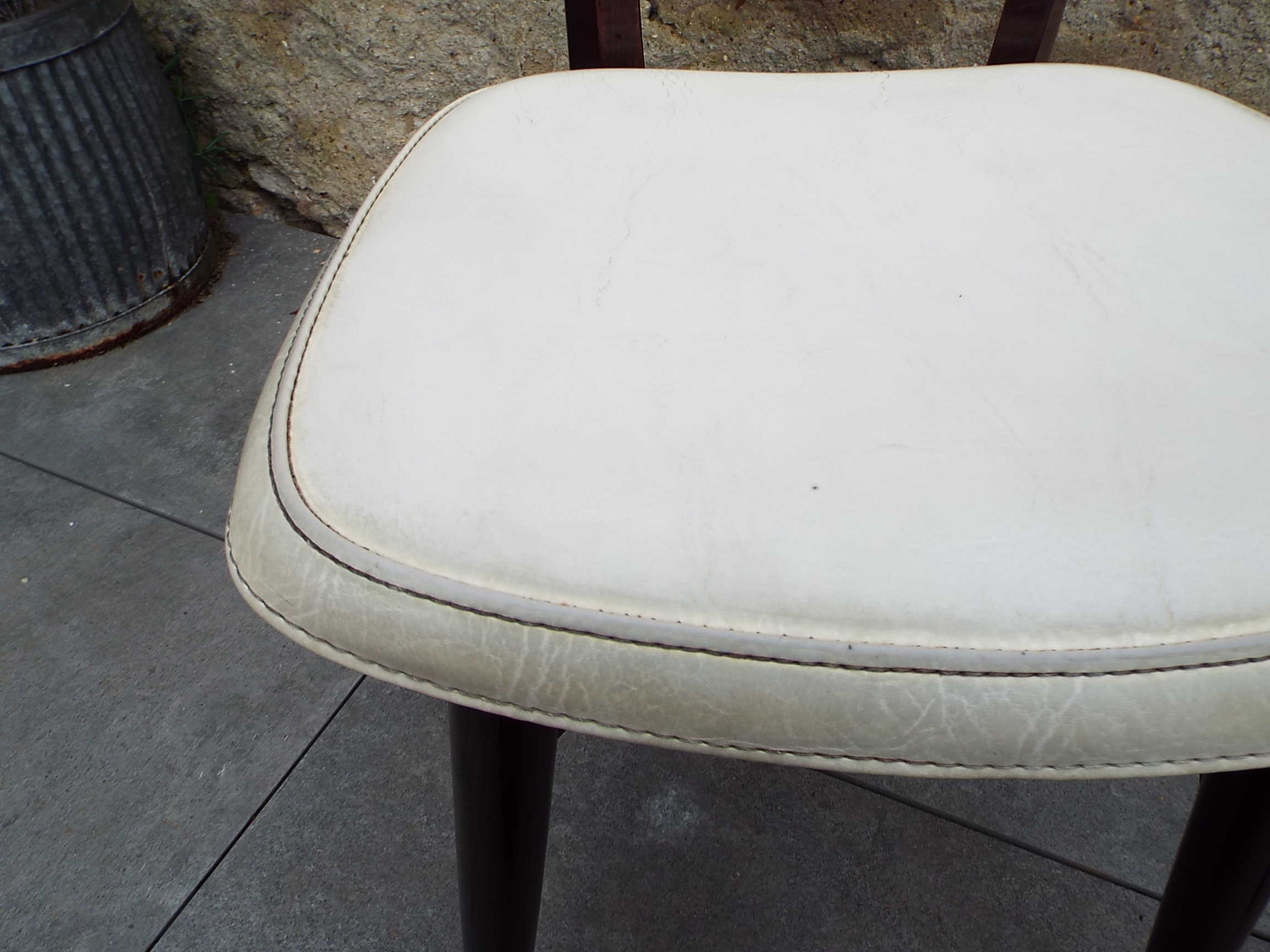 2 skai and wooden chairs