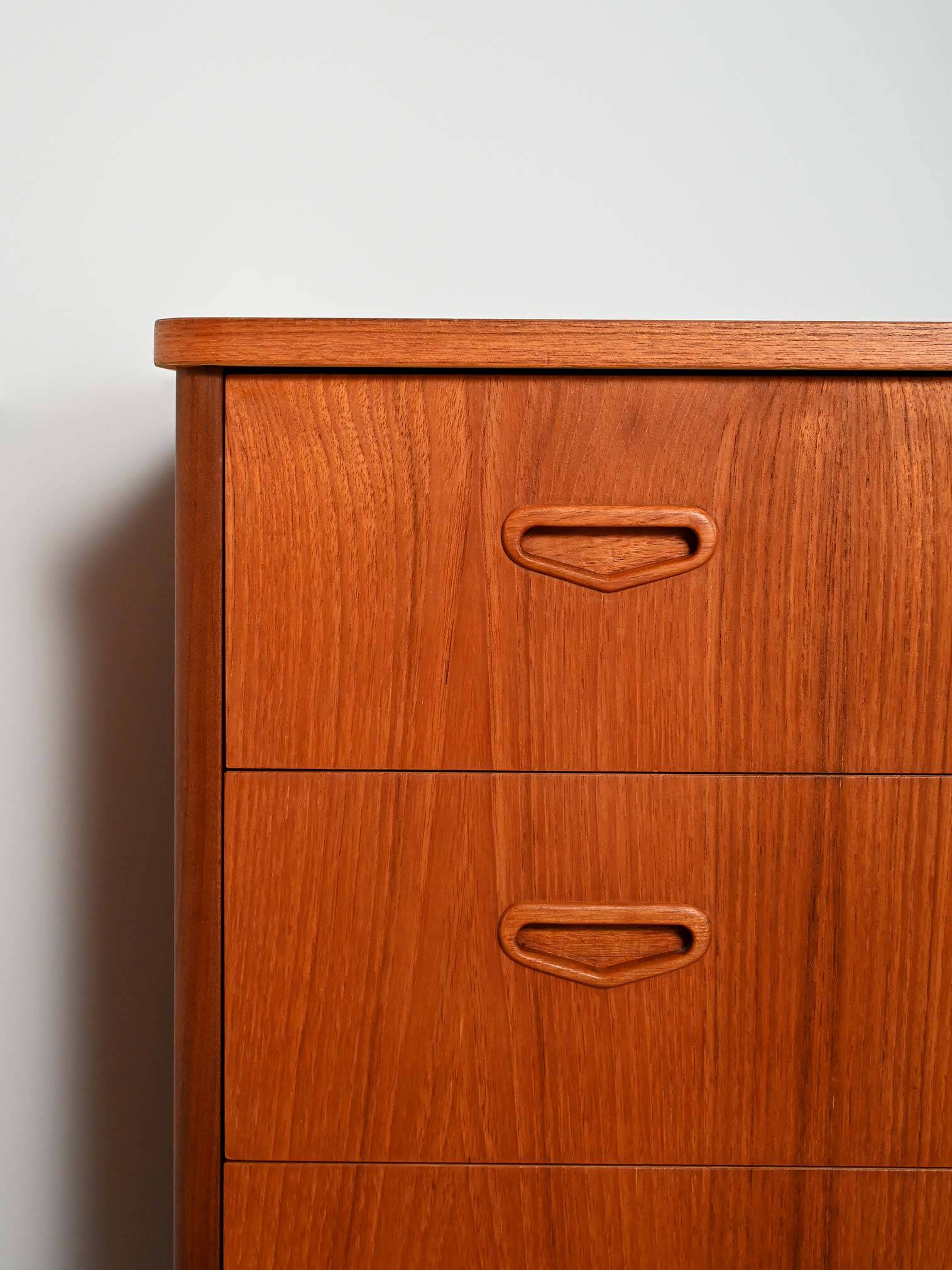 Scandinavian teak chest of drawers with sculpted recessed pulls