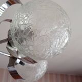 Vintage chandelier with glass globes and chrome steel