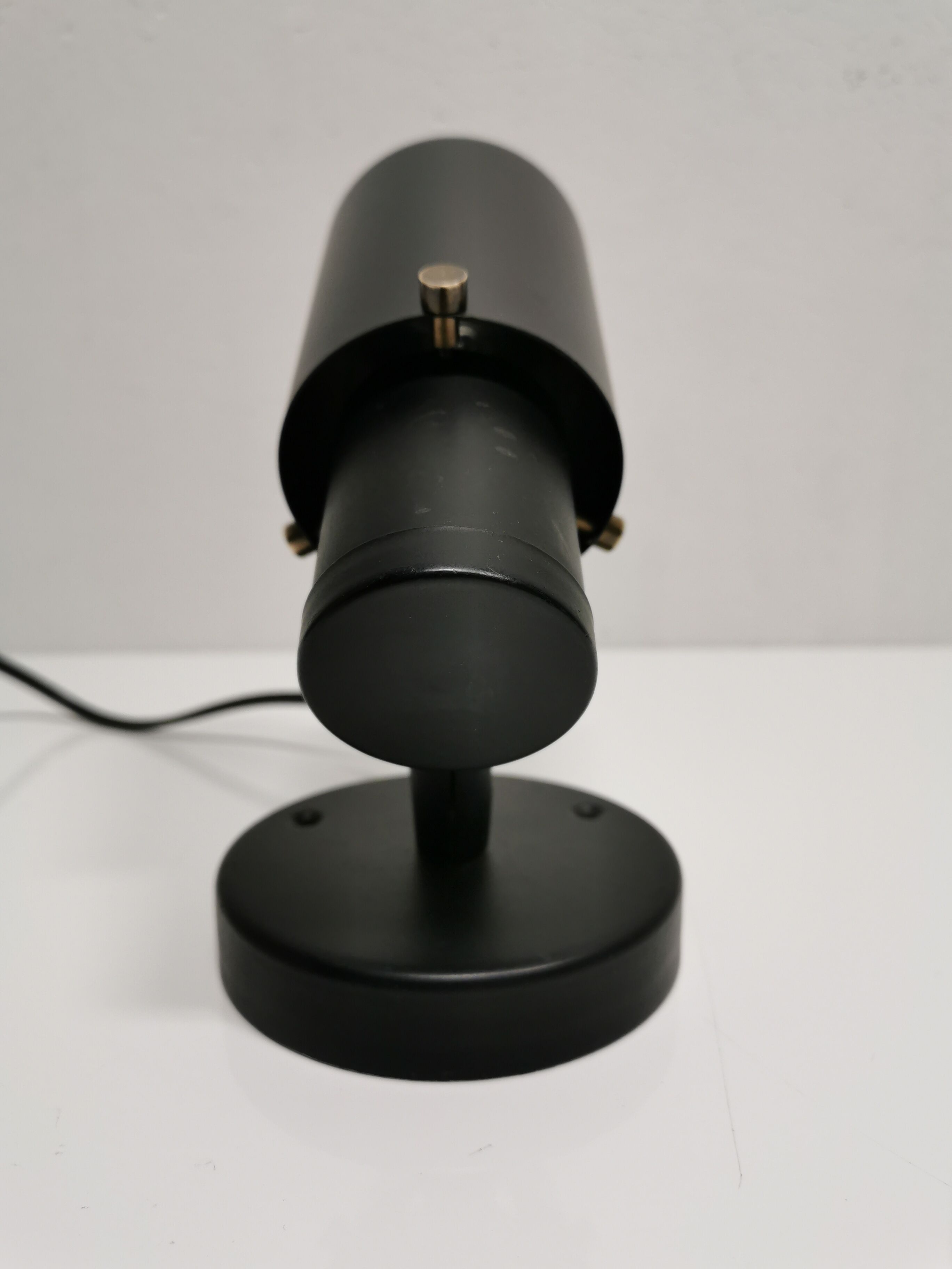 Jacques Biny's black zodiac sconce for Lita