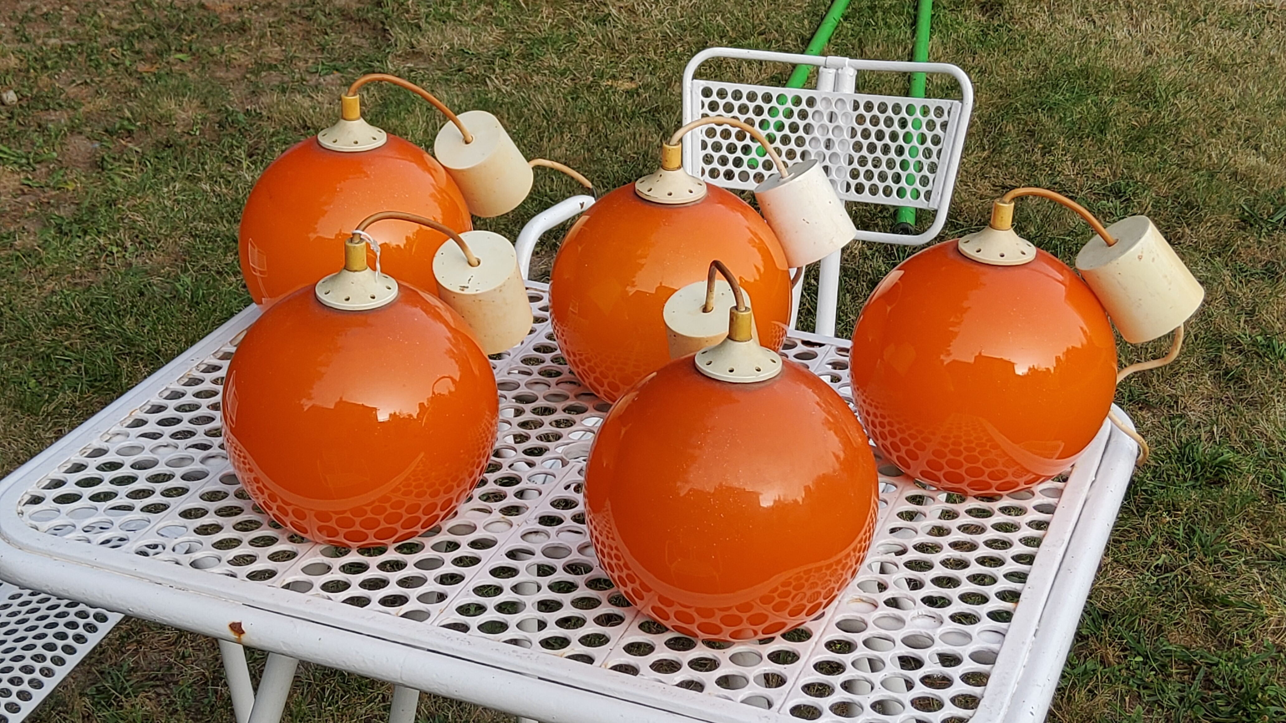 Set of 5 orange glass ball pendants from the 70s