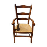 Grandfather's armchair in wood and straw.
