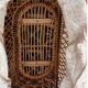 Vintage 1970s wicker cradle on wheels