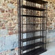 Large industrial black metal shelf – openwork graphic structure