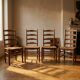 Ensemble de 4 chaises de salle à manger, chaises à dossier échelle en chêne rustique, années 1960, Belgique, sièges en osier.