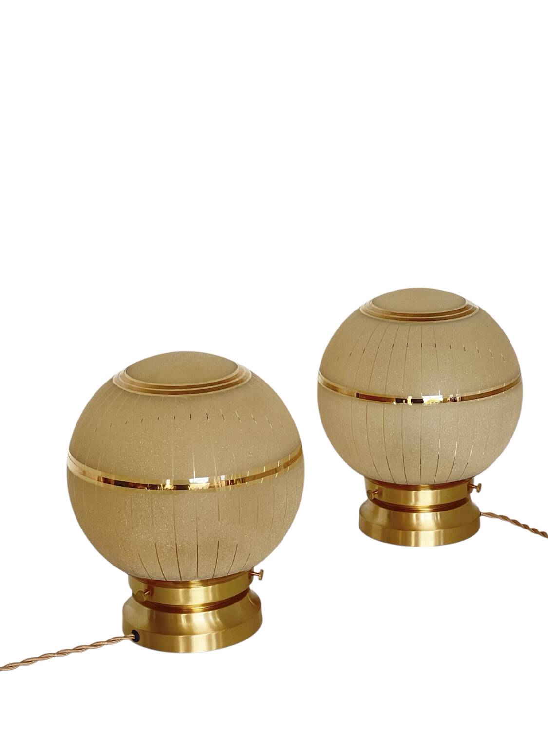 Pair of large art deco globe table lamps with brass legs