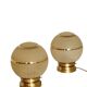 Pair of large art deco globe table lamps with brass legs