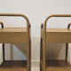 Old ochre metal bedside tables from a boarding school.