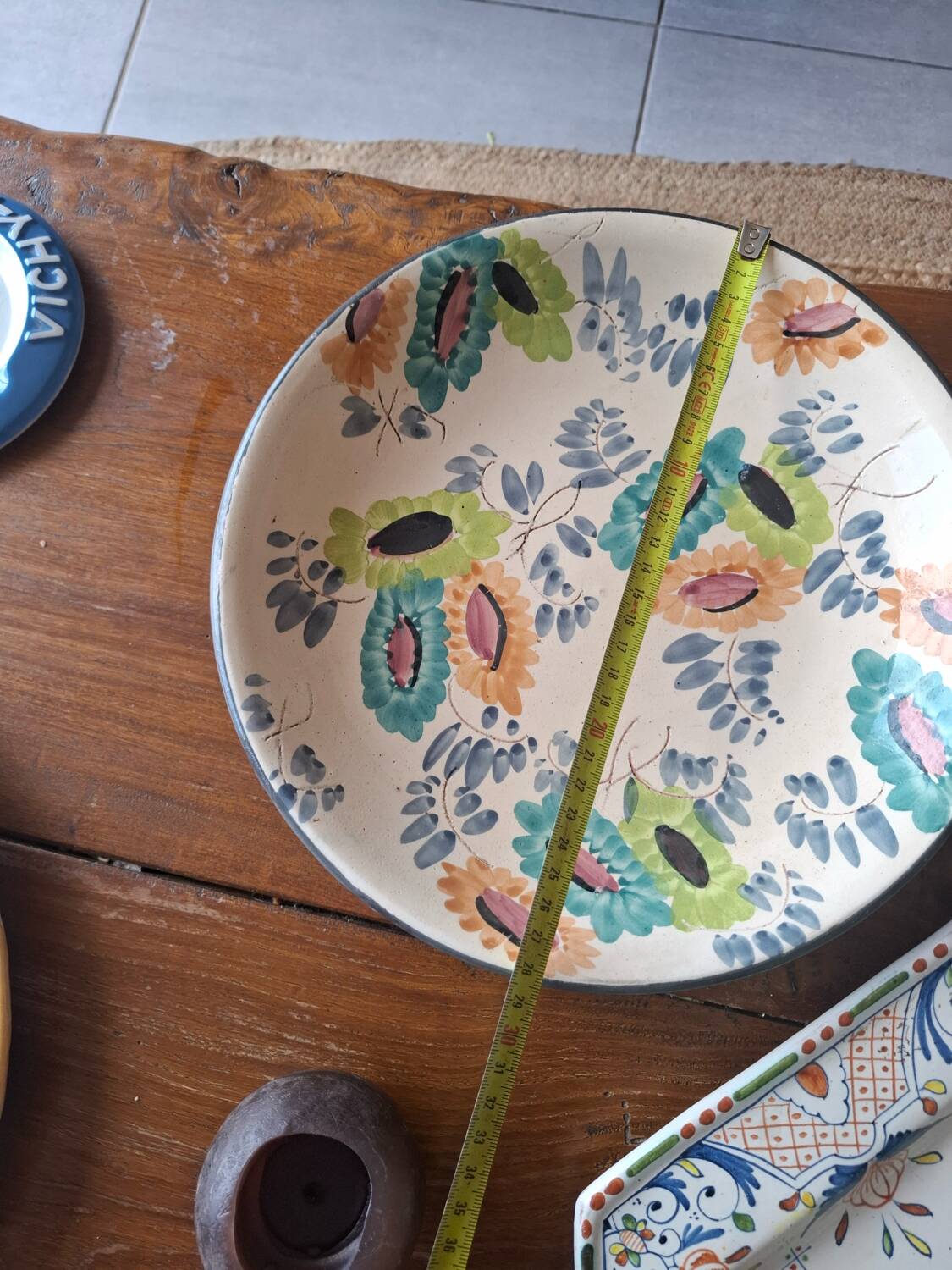 Glazed earthenware dish – polychrome floral decoration
