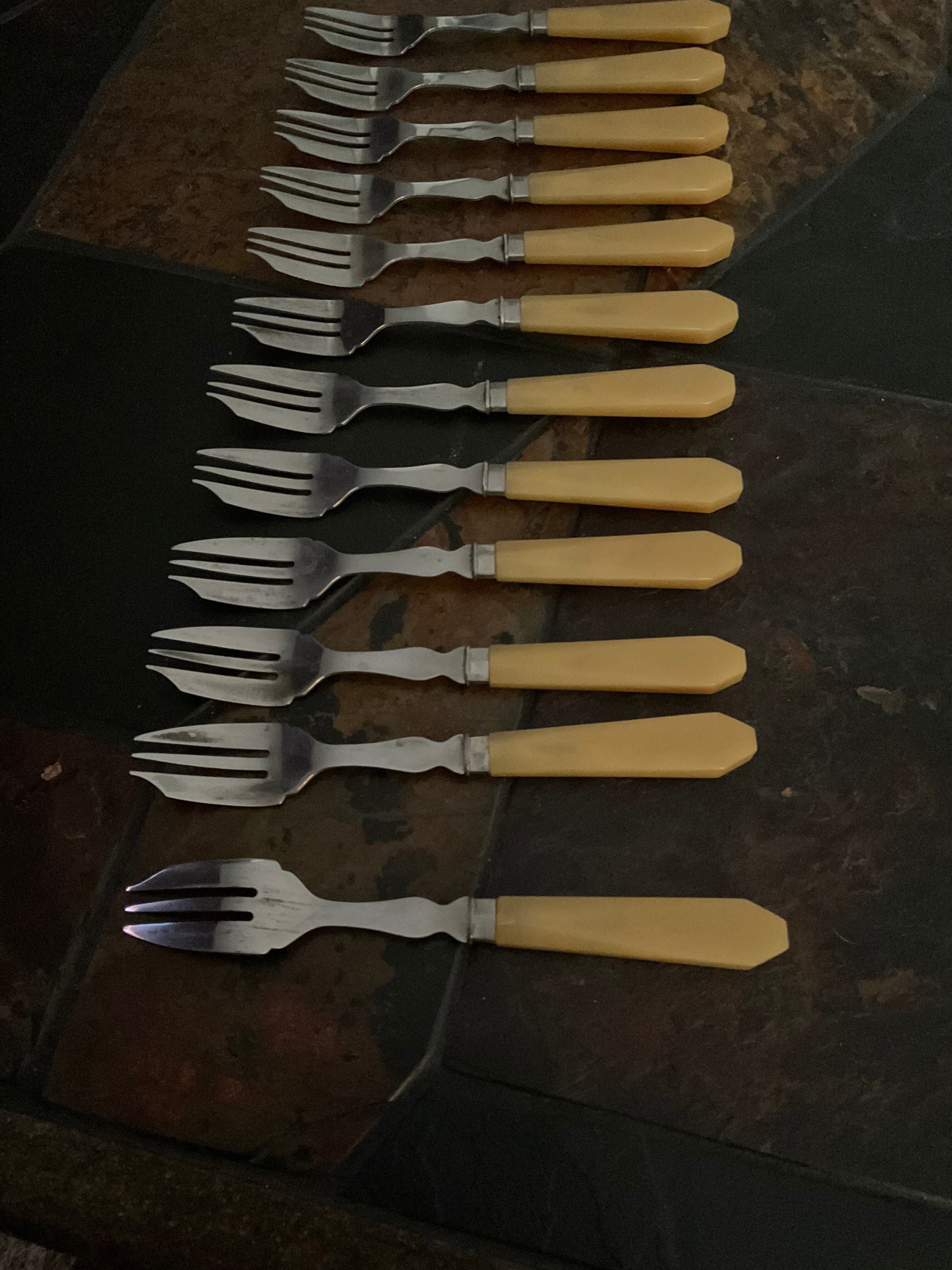 12 .vintage dessert forks