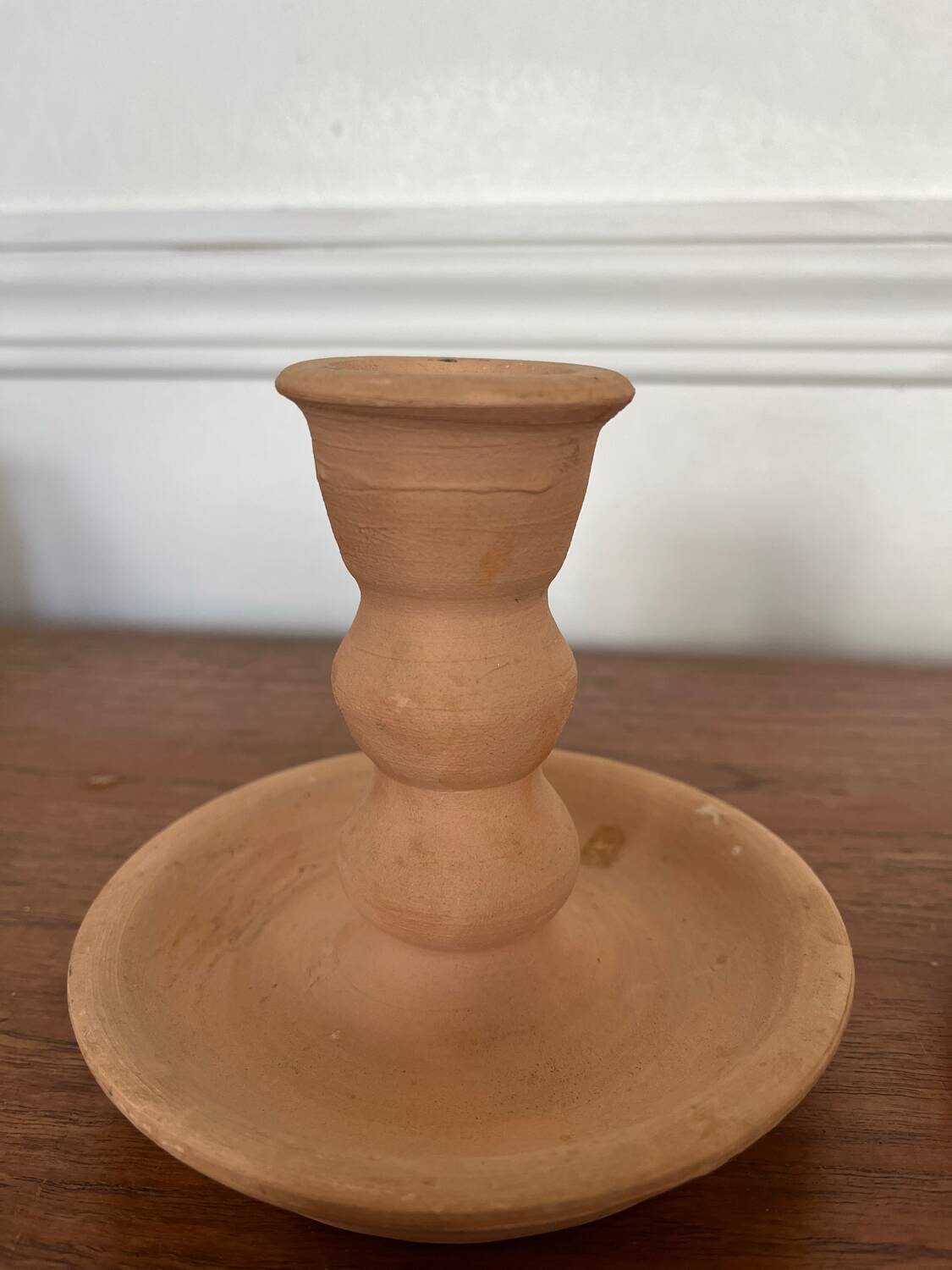 Pair of terracotta candlesticks