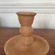Pair of terracotta candlesticks