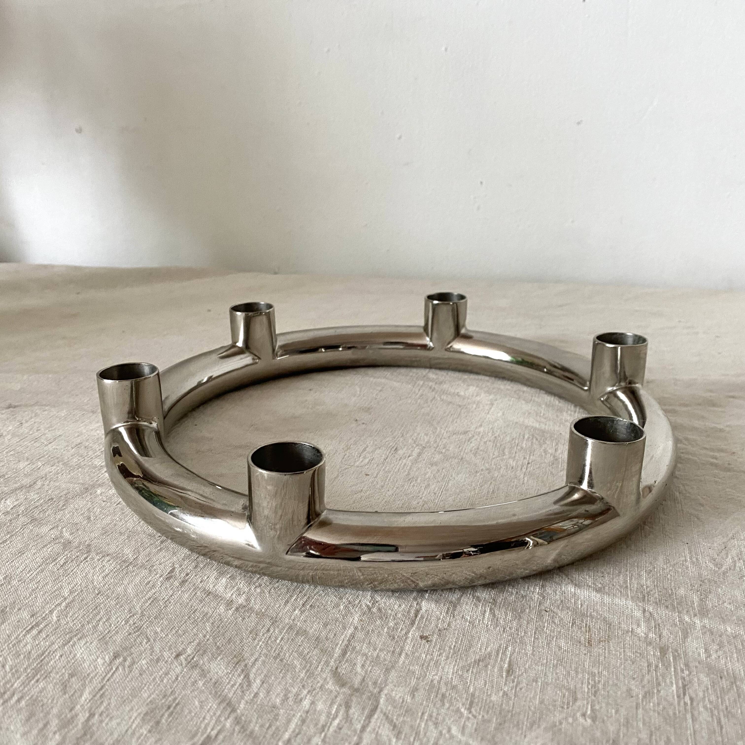 Tubular chrome candle holder