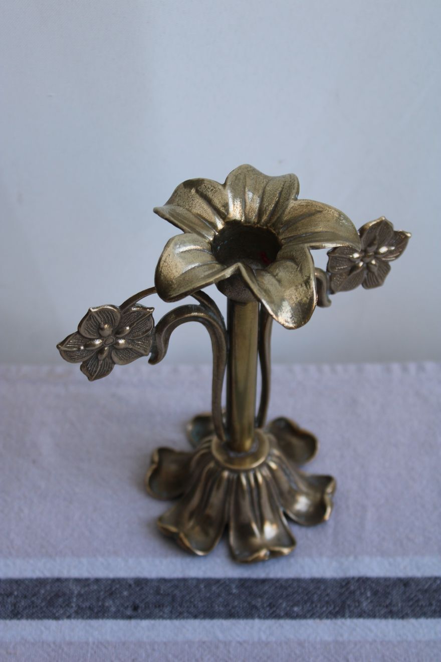 Golden metal stand candle holder
