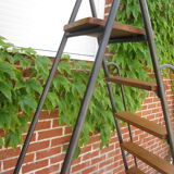 Old stepladder in metal and wood